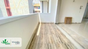 Windsor Avenue apartment progress – tile laying works underway, nearing handover stage.