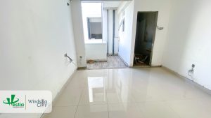 Windsor Avenue apartment progress – tile laying works underway, nearing handover stage.