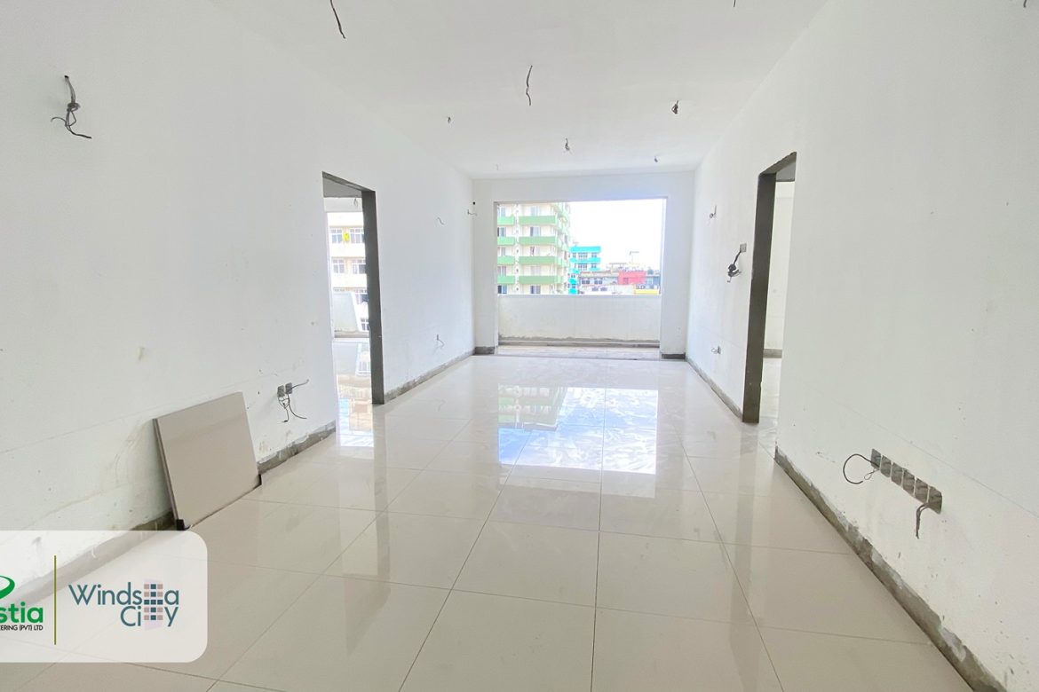 Windsor Avenue apartment progress – tile laying works underway, nearing handover stage.