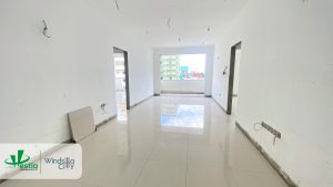 Windsor Avenue apartment progress – tile laying works underway, nearing handover stage.